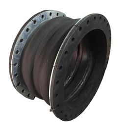 rubber expansion joint with rotating flange and tired assembly